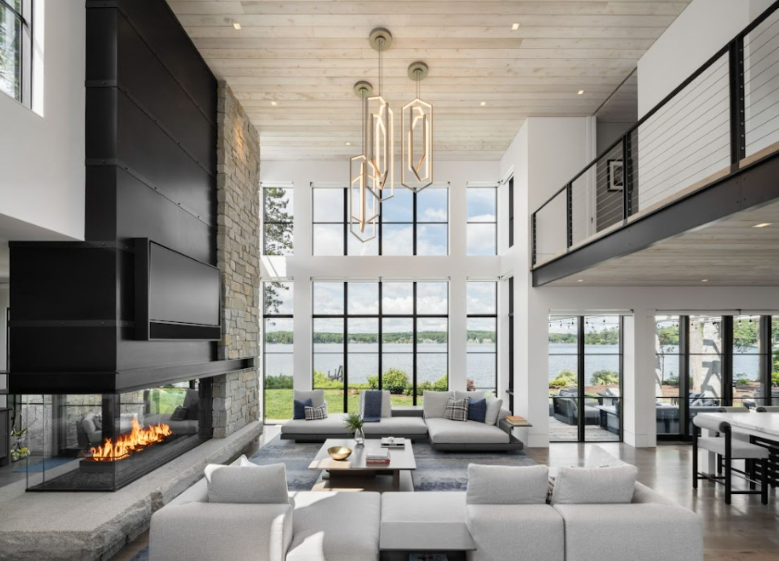 Photograph of a living room overlooking a body of water