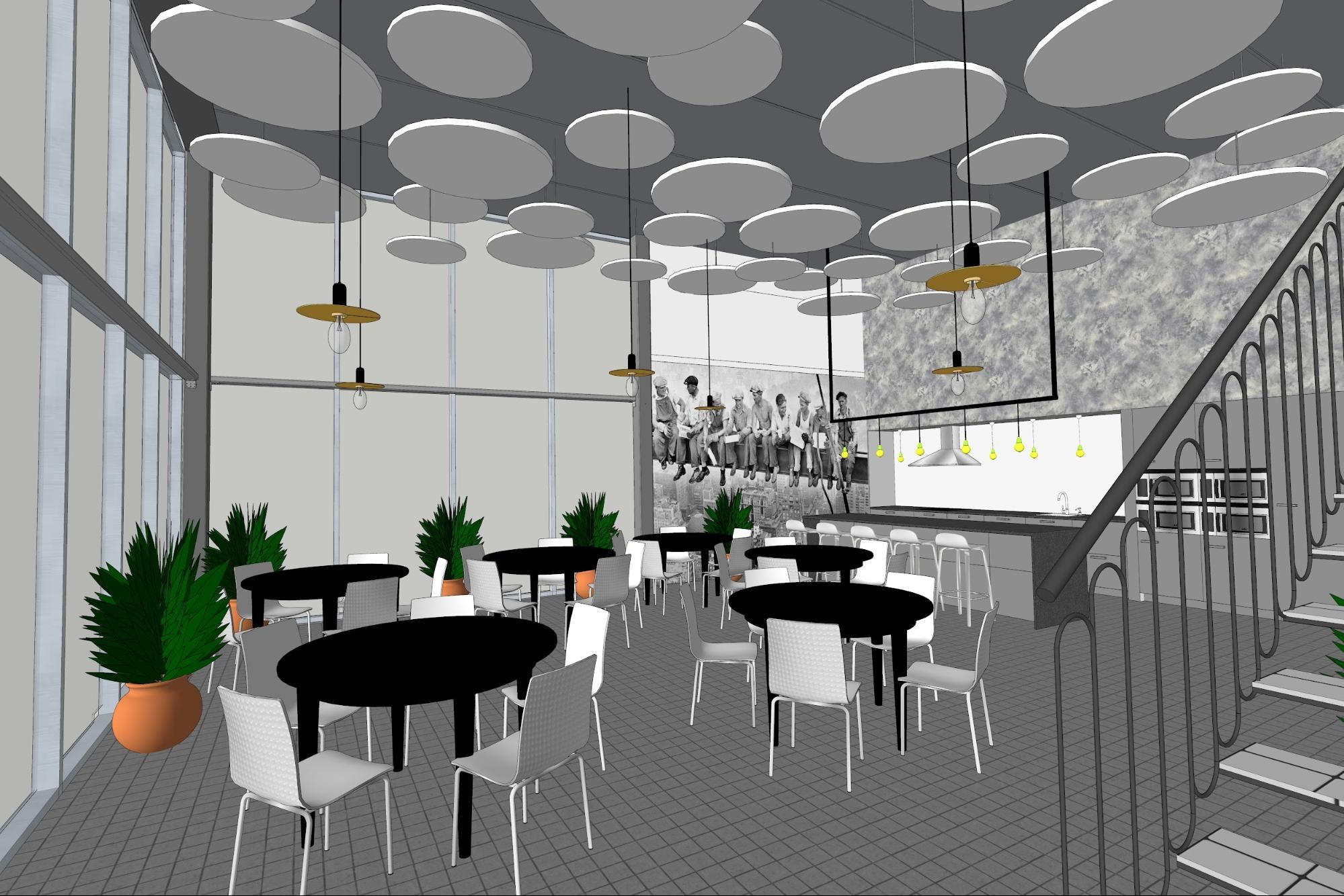 Interior view of a modern cafe with black tables, white chairs, and a prominent bar area.