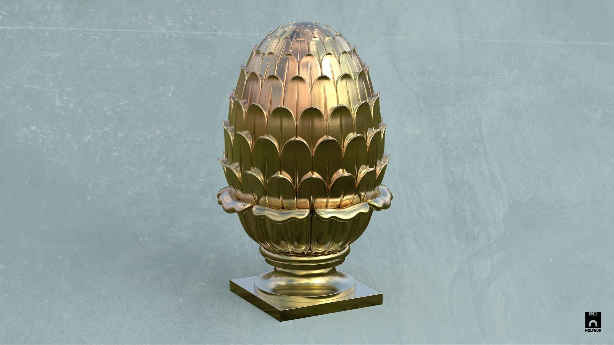 A golden pineapple finial with an ornate base sits on a textured surface.