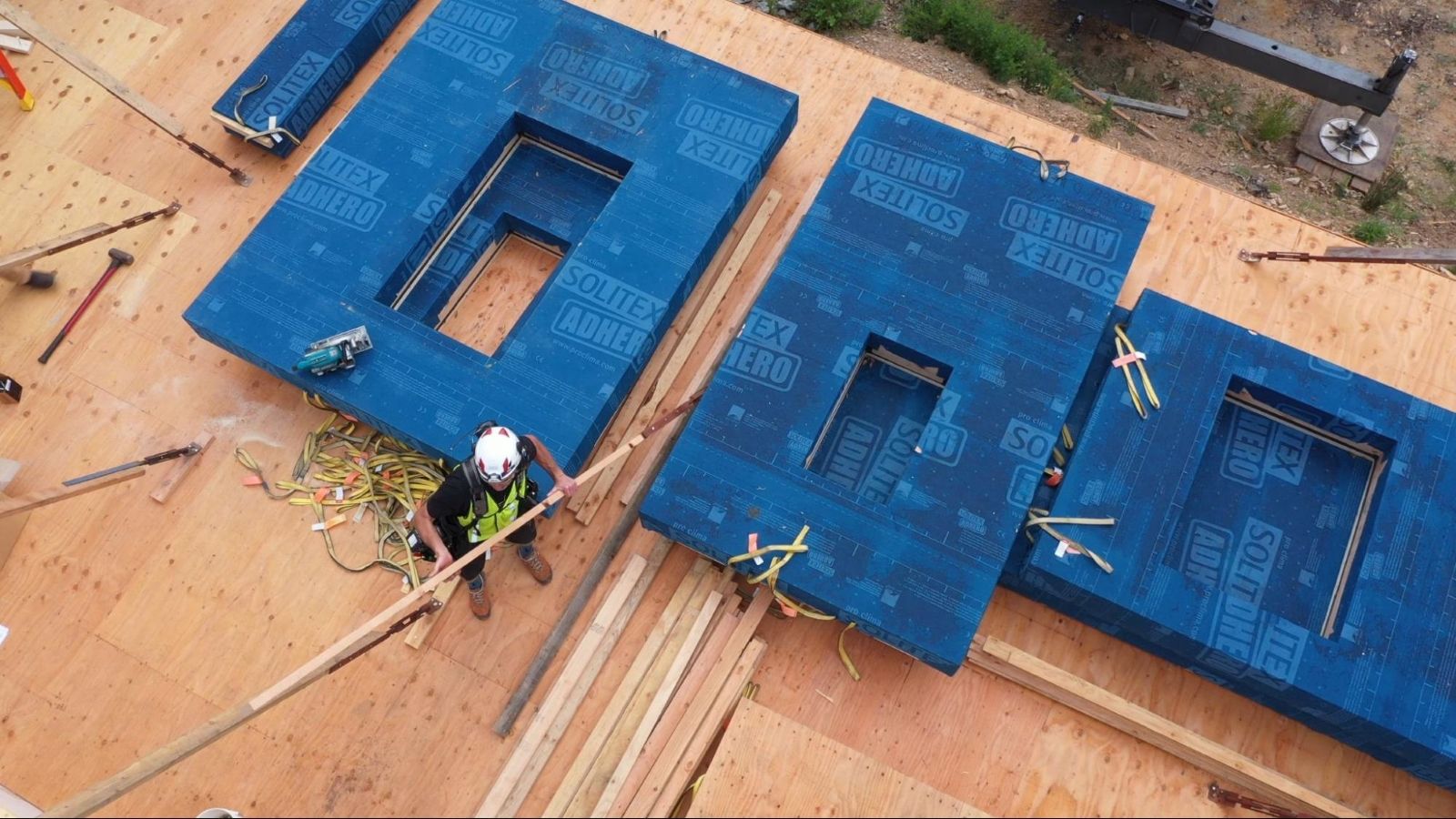 B. PUBLIC Prefab window panels on a construction site.