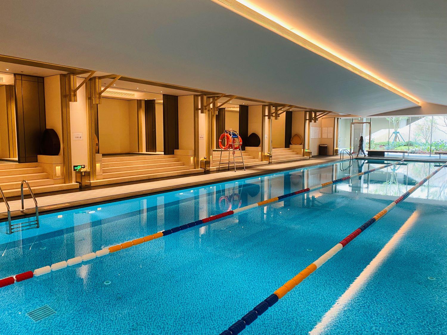 Swimming pool model vs. construction site vs. completion photo