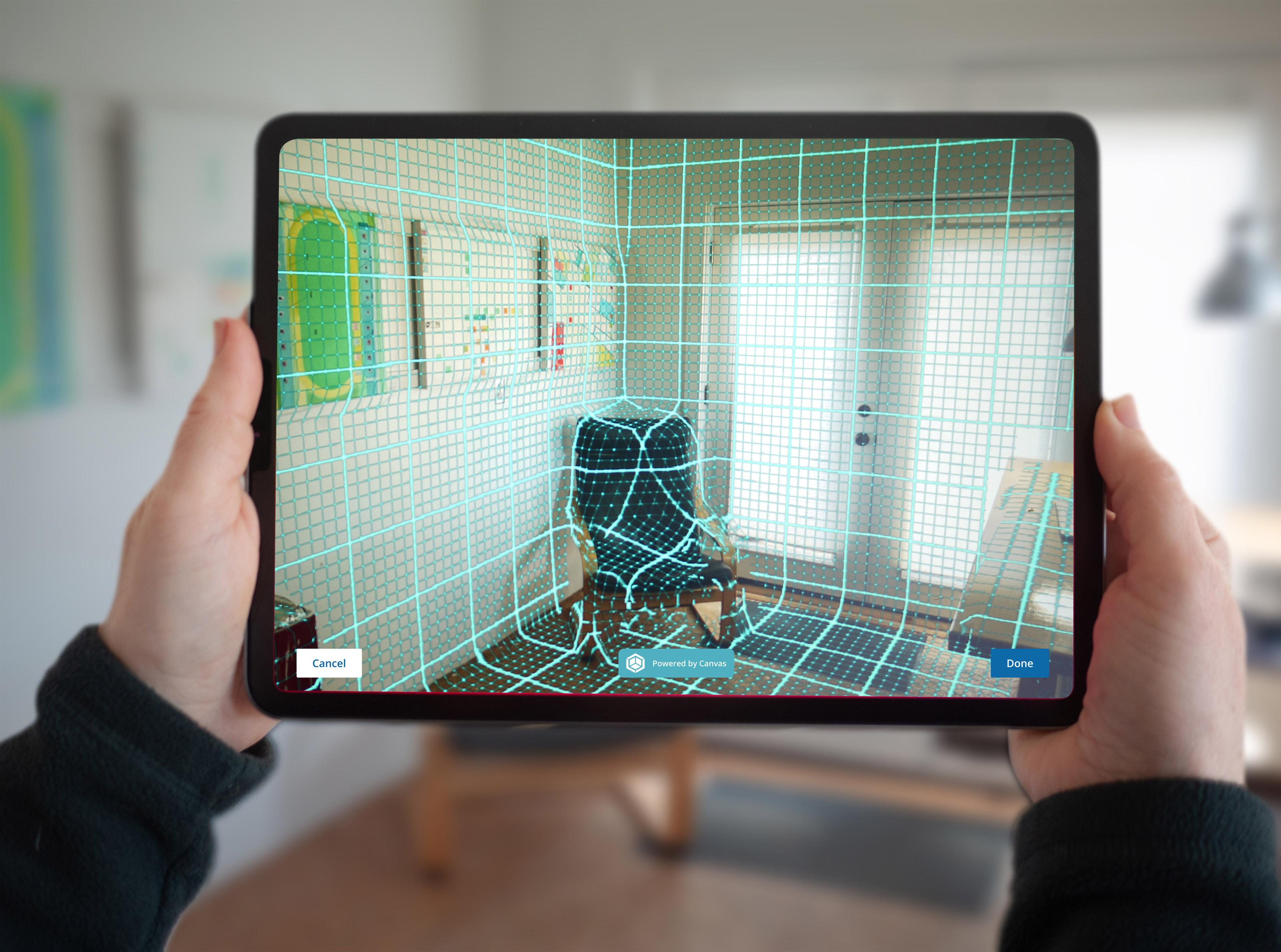 Hands holding an iPad showing Scan-to-Design UI within SketchUp