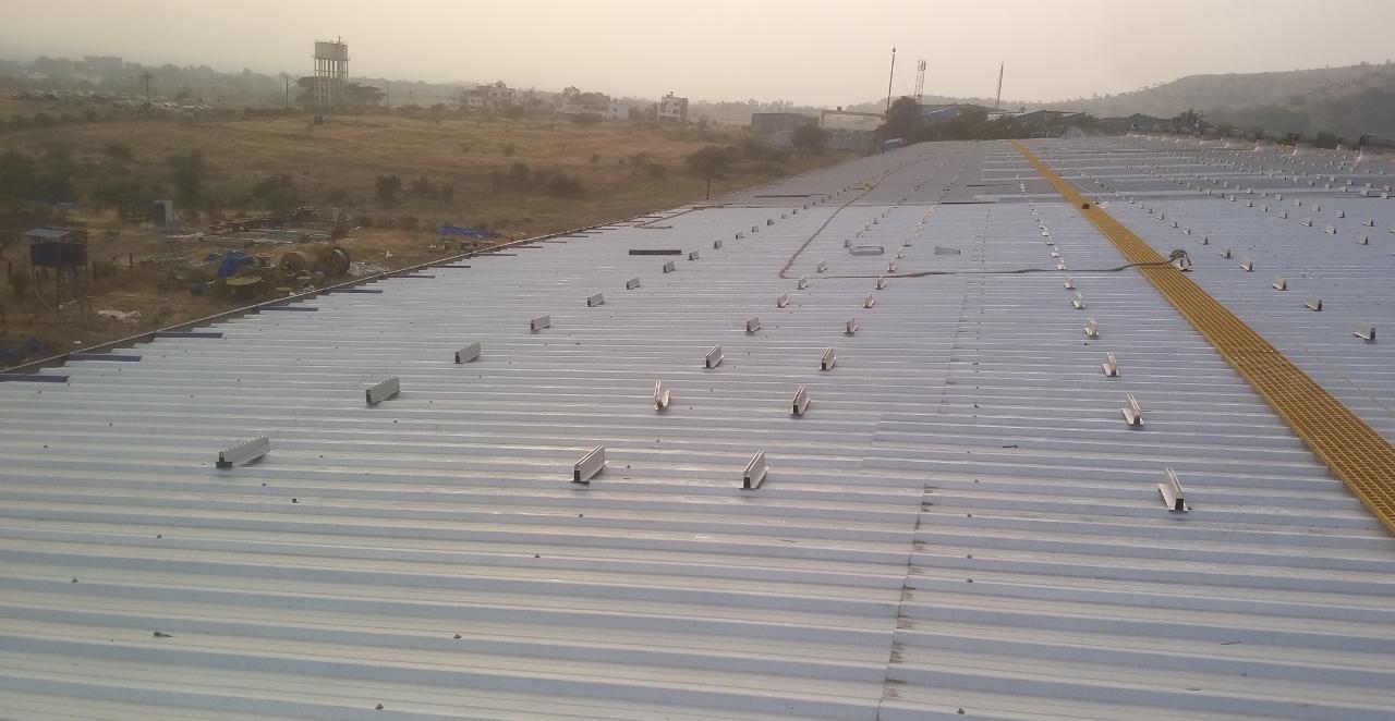 Solar panel installation on the roof of a building in India.
