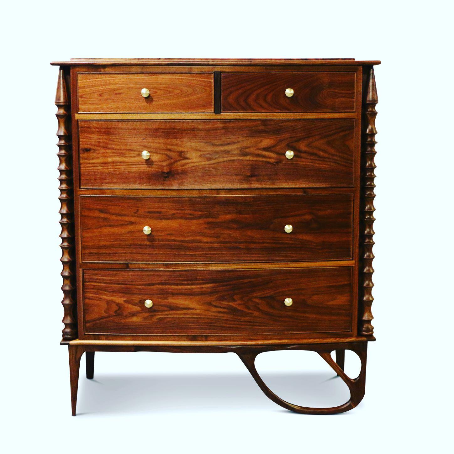 A photo of a custom-made walnut dresser