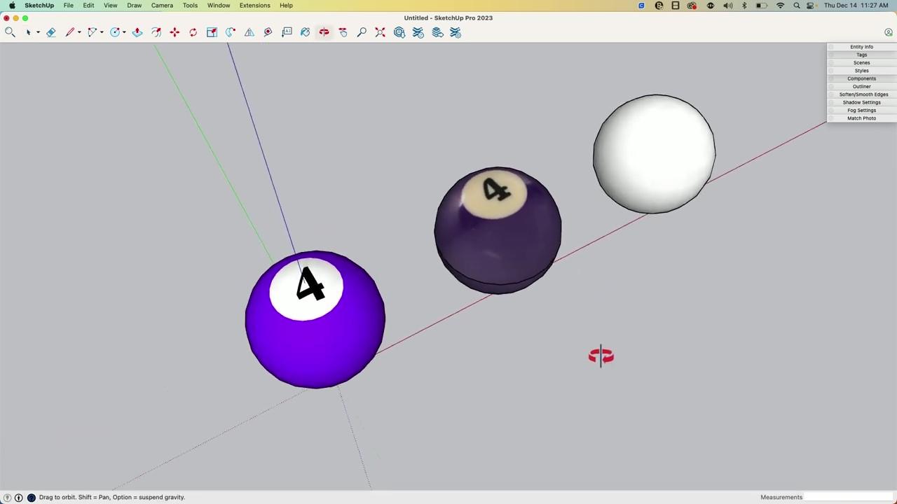 Screenshot of SketchUp UI showing two differently-materialled purple pool balls and a plain white sphere.